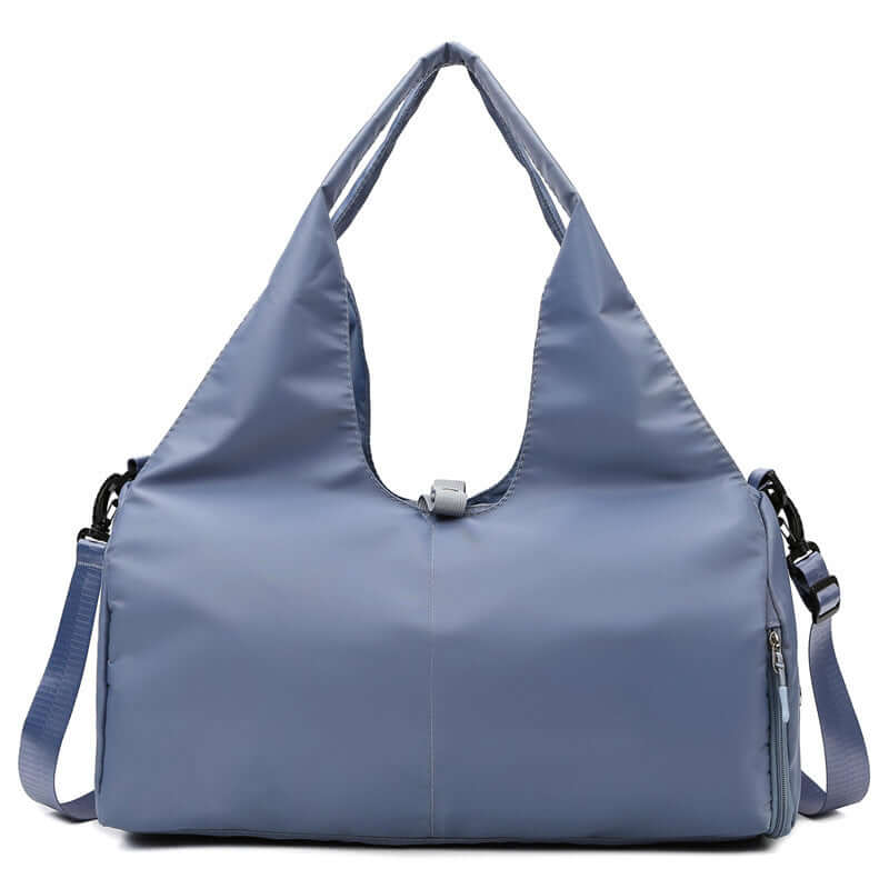 Womens Yoga Bag in light blue color featuring multiple carrying styles and spacious interior for yoga essentials.