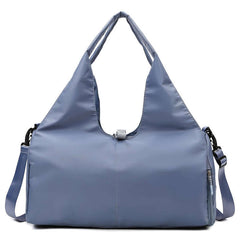 Womens Yoga Bag in light blue color featuring multiple carrying styles and spacious interior for yoga essentials.