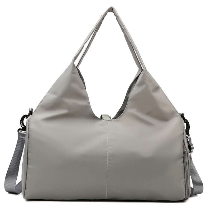 Womens Yoga Bag in grey, featuring shoulder strap and spacious design for yoga essentials.