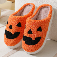 Halloween Pumpkin Cartoon Women's Shoes with orange fuzzy design and black face features.