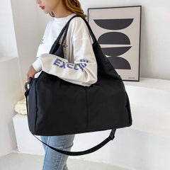 Womens Yoga Bag shown in black, stylish design suitable for gym and everyday use, featuring a shoulder strap.