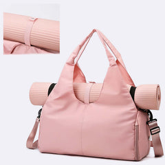 Womens Yoga Bag designed for carrying a yoga mat in a stylish pink color, with shoulder and crossbody straps.