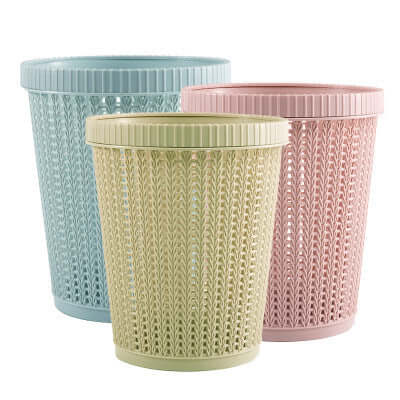Three colorful portable garbage bags with box in pink, light green, and blue colors, perfect for outdoor use.