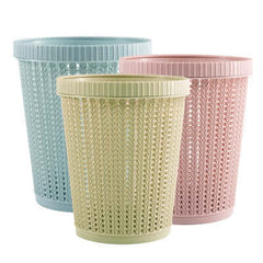 Three colorful portable garbage bags with box in pink, light green, and blue colors, perfect for outdoor use.